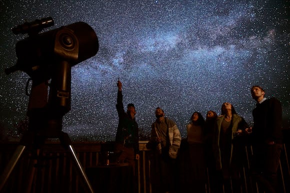 A group of people stargazing
