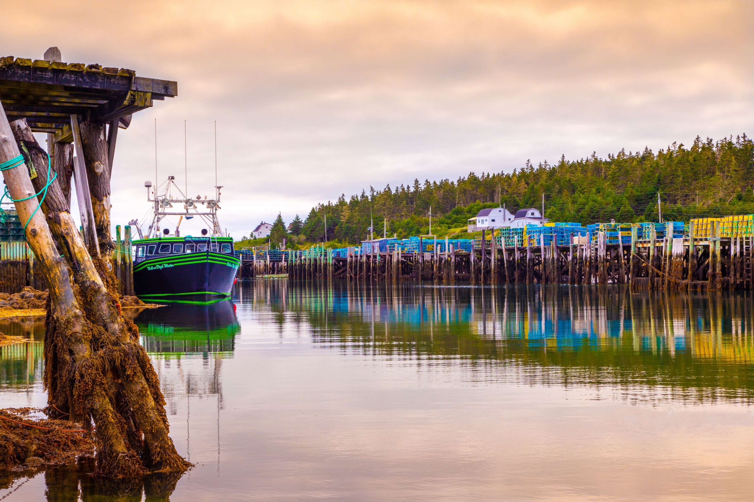 A blue and green fishing boat in Yarmouth Harbour